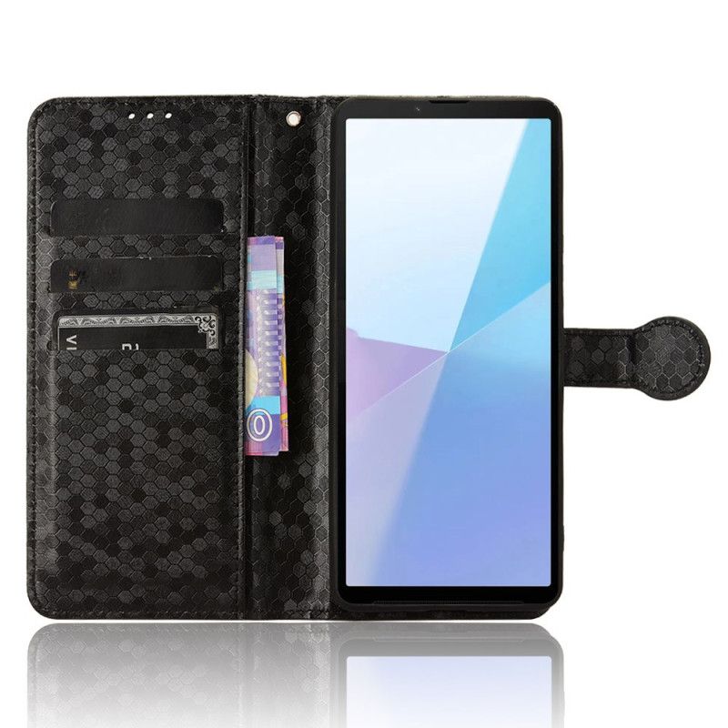 Flip Cover Sony Xperia 10 Vi Skinnende Prikker Med Rem