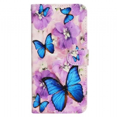 Flip Cover iPhone 16 Plus Sommerfugle Og Lilla Blomster Med Rem